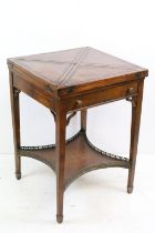 Edwardian Mahogany Envelope Card Table, the four brown leather inset flaps opening to a playing