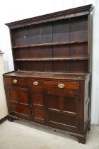 18th century Panelled Oak Dresser, the upper section with two plate shelves over a base with three