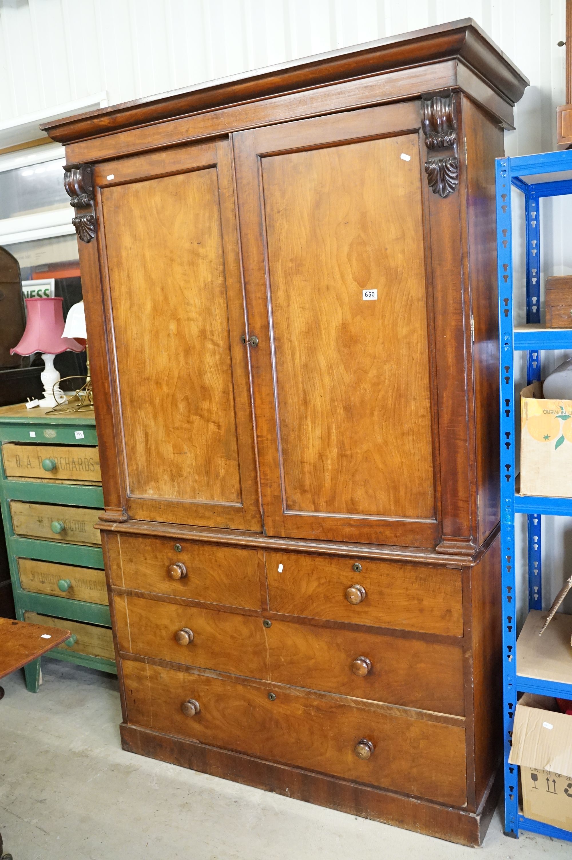 19th century Mahogany Linen Press, the two upper panel doors opening to four pull-out linen