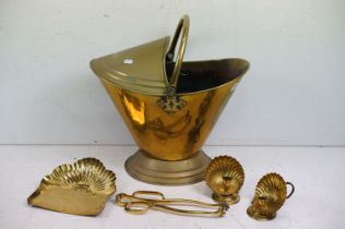 Brass coal scuttle of helmet form, with loop handle (approx 40cm high - excluding handle),