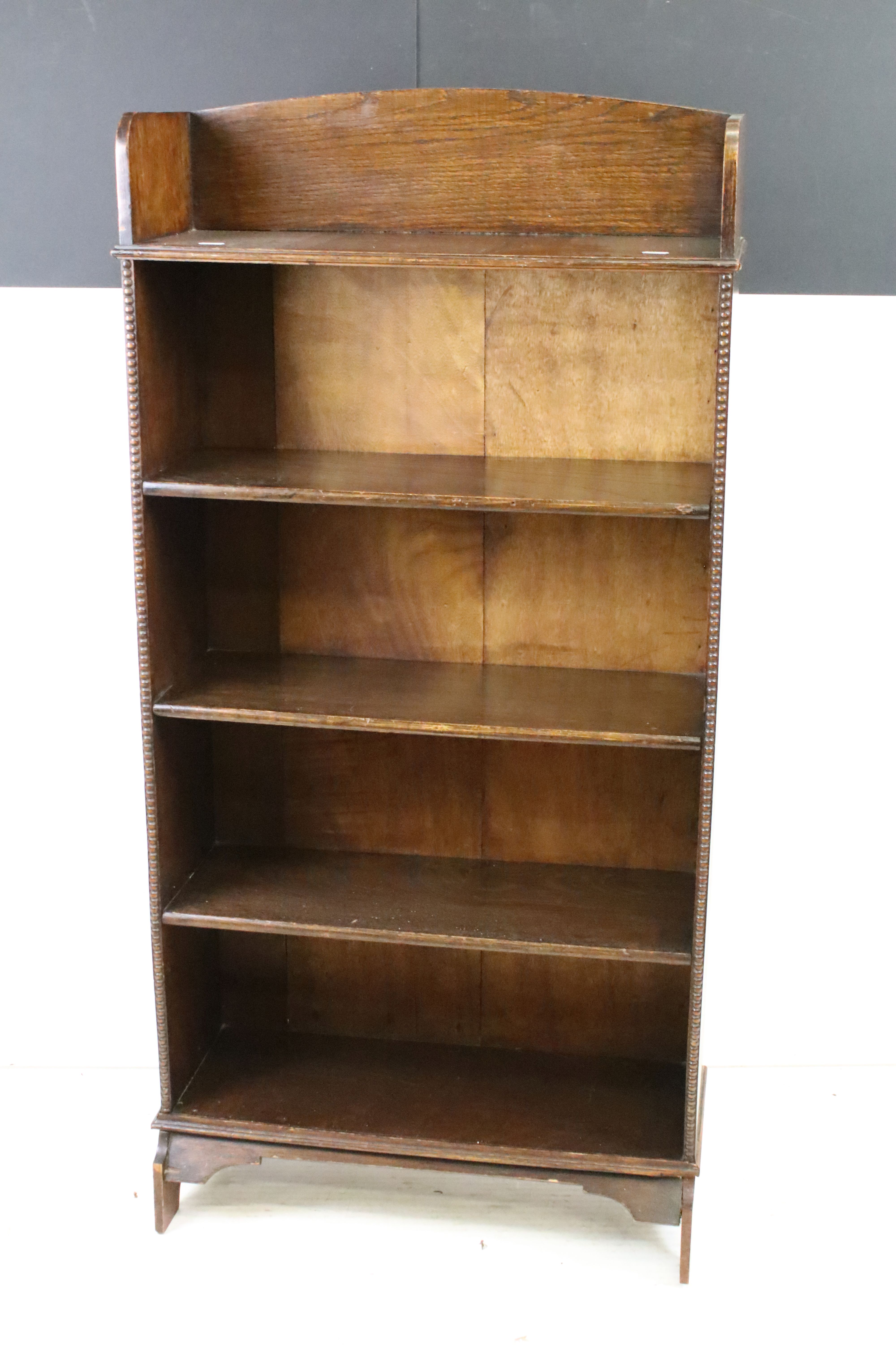 Early to Mid 20th century Oak Bookcase with beaded edge and five fixed shelves, 62cm wide x 23cm