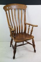 19th century Elm Seated Lathe Back Windsor Elbow Chair, 65cm wide x 107cm high
