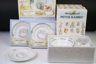 Four Wedgwood Peter Rabbit mug and bowl boxed sets together with two boxed Peter Rabbit plates and