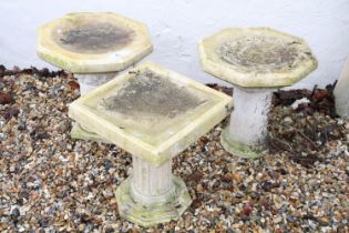 Group of three contemporary reconstituted stone bird baths on Corinthian column bases, two of