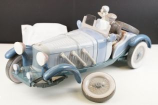 Large Lladro ' High Speed ' porcelain model, no. 1779, with driver & female passenger, measures