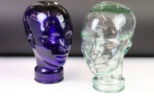 Pair of pressed glass shop display heads to include one blue glass example and one clear glass