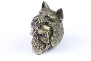 Brass vesta case in the form of a dog and skull