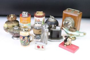 A large collection of vintage and contemporary pocket and table lighters together with wooden ever-