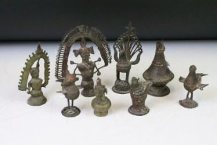 A collection of cast metal Indian ornamental figures to include religious examples.