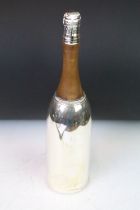 Cocktail shaker in the form of a champagne bottle