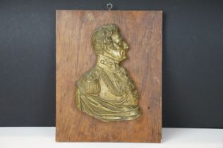 19th Century Duke of Wellington gilt metal profile, mounted on a rosewood panel. Measures approx