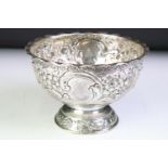 19th Century Victorian silver hallmarked footed bowl having repousse floral and scrolled detailing