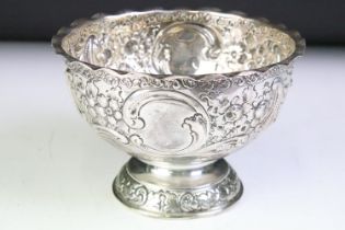 19th Century Victorian silver hallmarked footed bowl having repousse floral and scrolled detailing