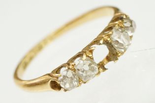 Antique 18ct gold and diamond ring. The ring being set with four old cut diamonds (one missing to