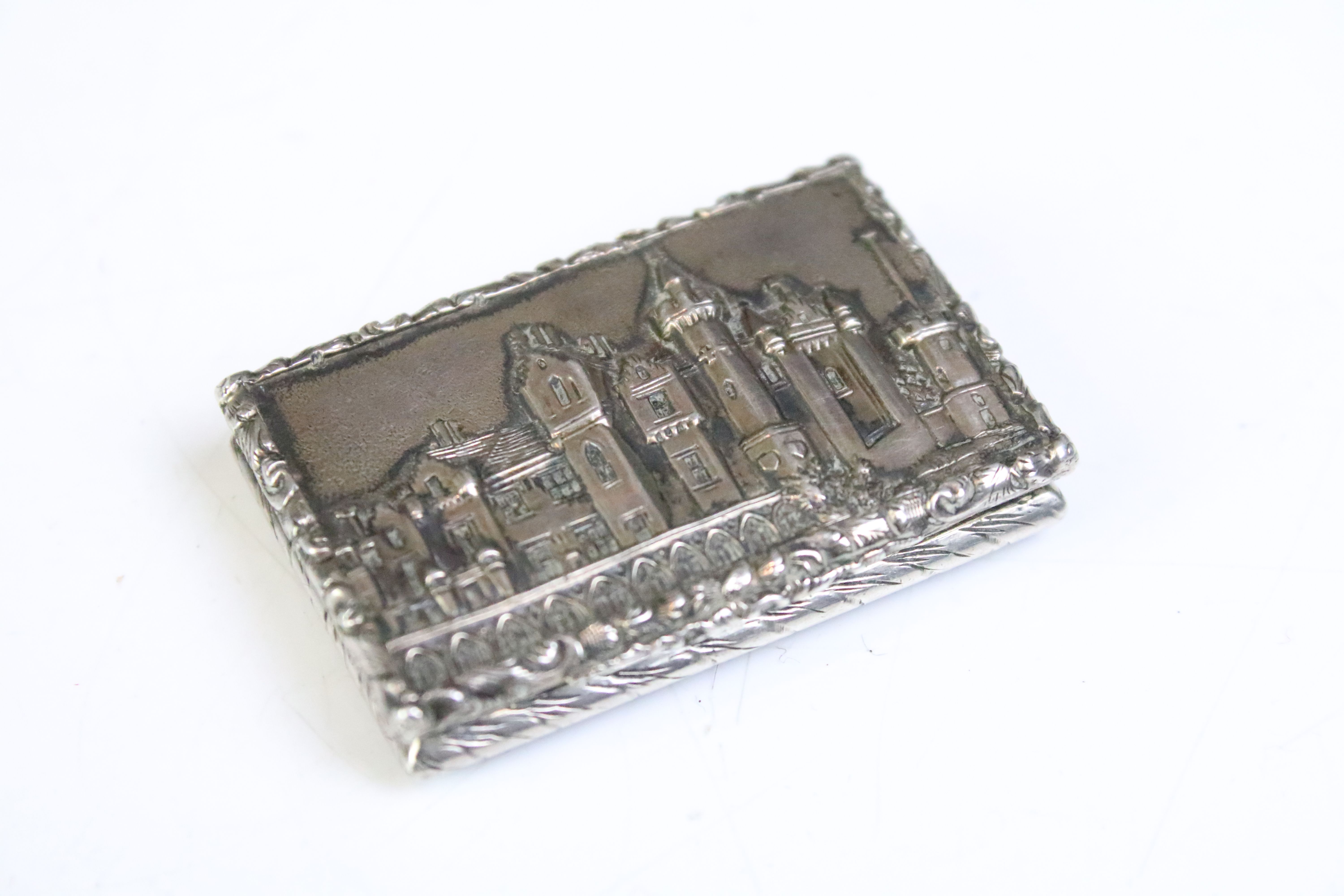 19th Century Victorian silver castle top vinaigrette. The vinaigrette having a hinged lid with