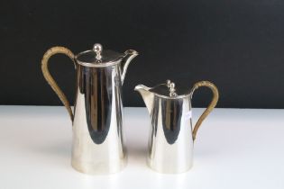 Early 20th Century silver hallmarked coffee pot having moulded rim with wicker handle (hallmarked