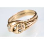 9ct gold and diamond antique snake ring in the form of two entwined snakes, each with a round single