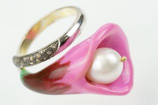 Enamelled flower formed ring being set with a cultured pearl to the head with diamond accent