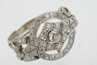 Art Deco 18ct white gold and platinum diamond panel ring being set with a round brilliant cut