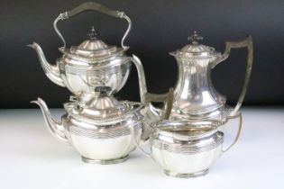 Early 20th Century four piece silver hallmarked tea set to include tea pot, twin handled sugar bowl,