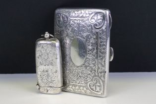 Early 20th Centurys silver hallmarked wallet with green leatherette interior (hallmarked