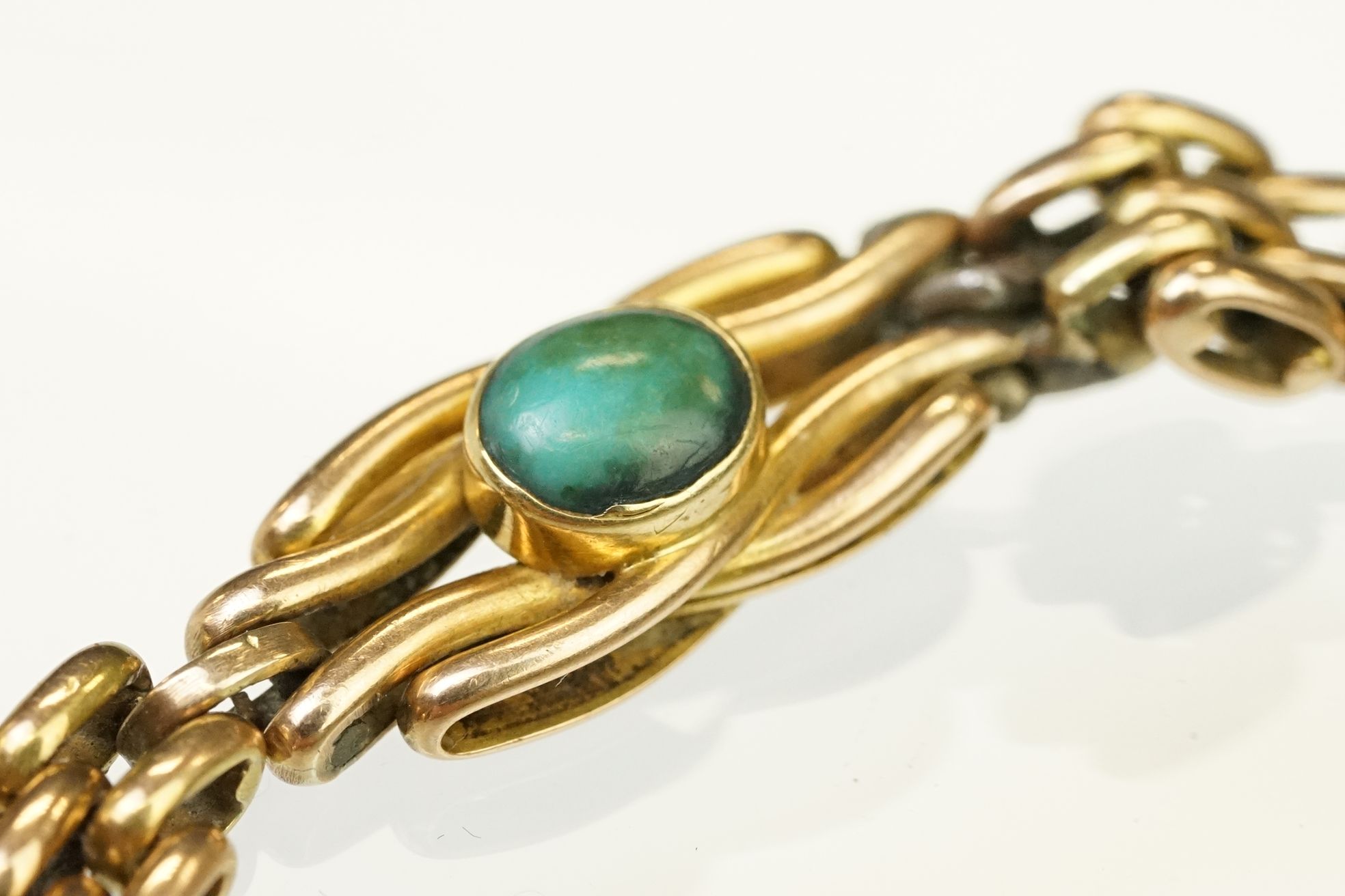 15ct gold and turquoise gate link bracelet. The bracelet being beze set with five oval turquoise - Image 4 of 10