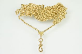 14ct gold modern long guard necklace chain having a heart terminal with screw action dog lead clasp.