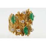 Mid Century emerald and diamond bark effect modernist style ring. The ring having a textured bark