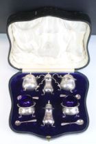 Cased Mappin & Webb silver cruet set consisting of two mustard pots, two table salts and two