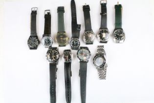 A collection of eleven mechanical wristwatches with black dials to include Oriosa, Avia, HMT,