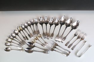 Collection of silver fiddle pattern flatware, mostly Victorian, to include dessert spoons, dessert