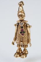 9ct gold hallmarked clown pendant having articulated limbs set with coloured stones to the tie.