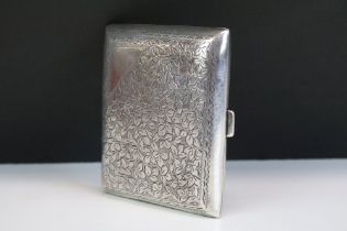 Early 20th Century silver hallmarked cigarette case having engraved foliated detailing to the