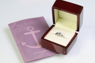 18ct white gold and tanzanite ring being set with a square cushion cut tanzanite to the head