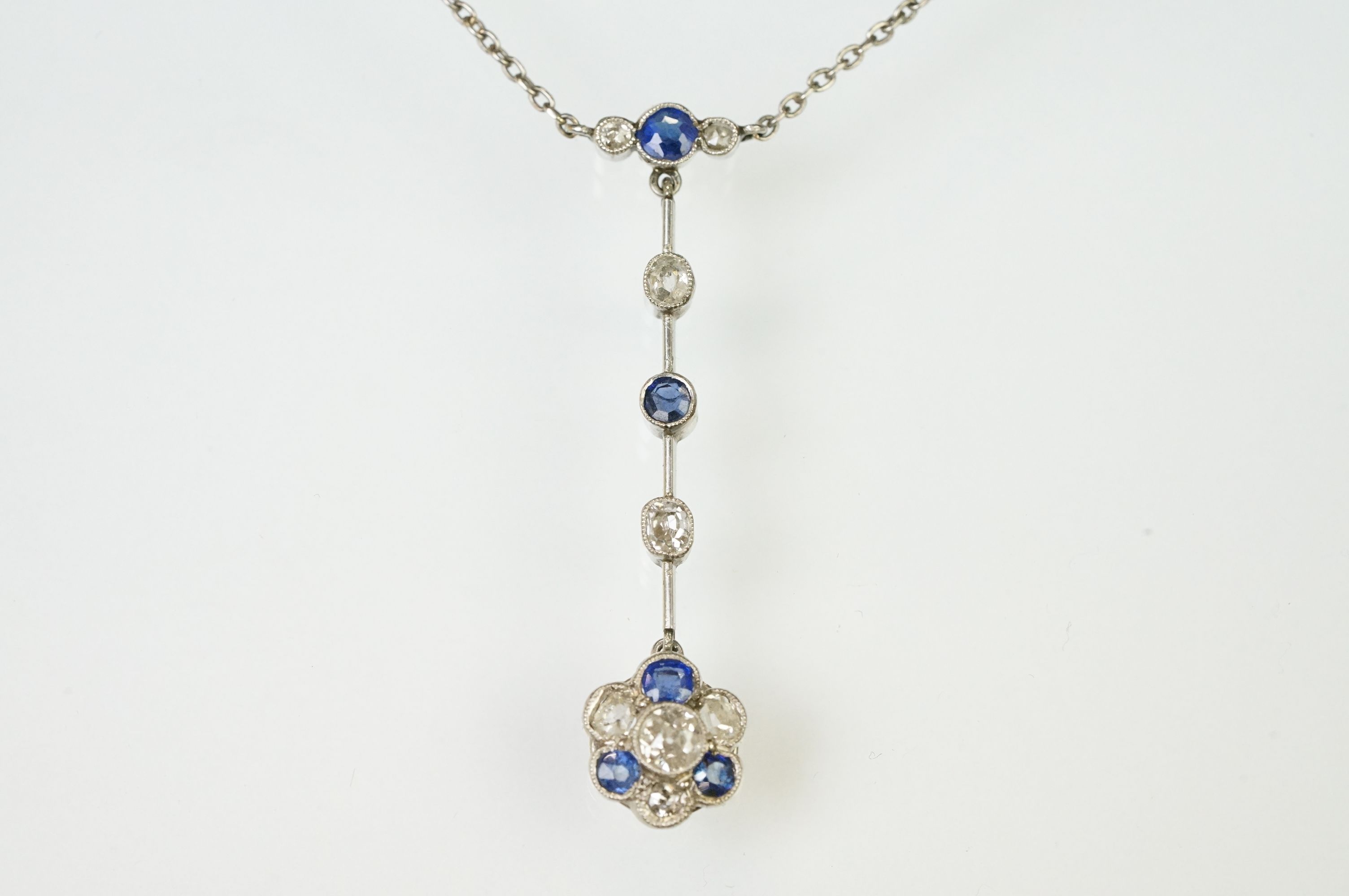 Early 20th Century Edwardian sapphire and diamond pendant necklace. The necklace having a pendant