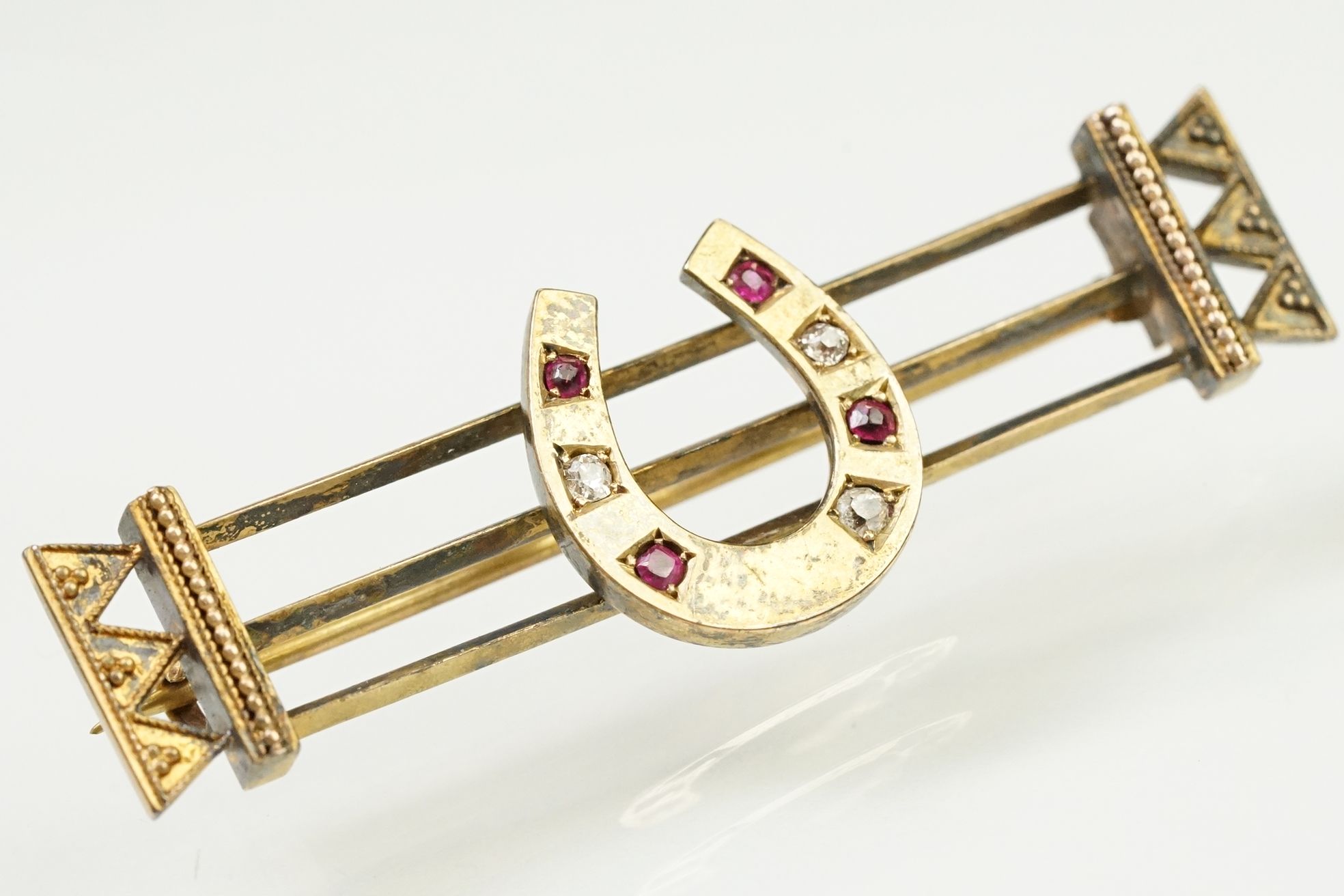 Assortment of jewellery to include Victorian horse shoe bar brooch set with rubies and diamonds, - Image 10 of 20