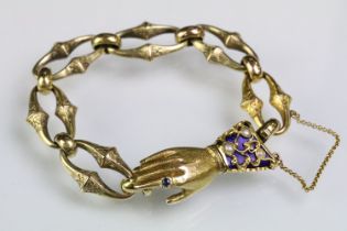 19th Century Victorian gold bracelet having a hand modelled clasp. The clasp having a blue enamelled