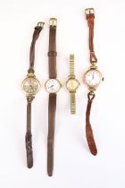 A collection of four ladies hallmarked 9ct gold cased wristwatches to include Zenith and Smiths