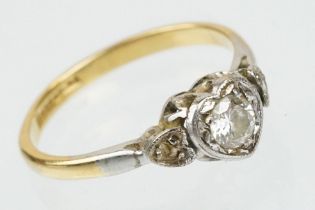 18ct gold diamond solitaire ring. The ring being set with a round brilliant cut diamond set within a