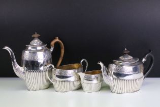 Victorian four-piece silver tea set, of gadrooned form, with a band of floral & foliate