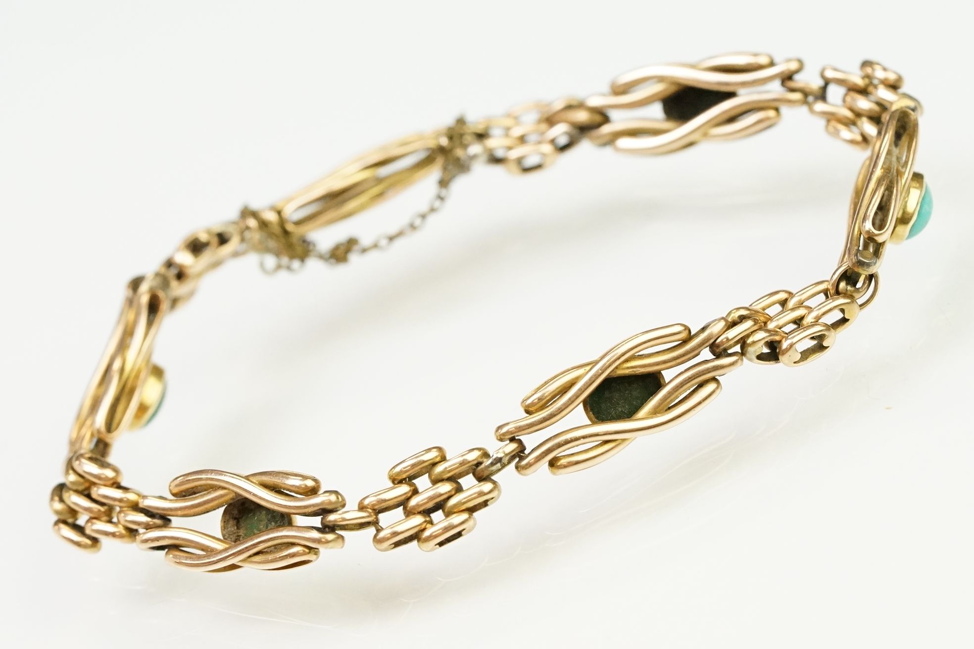 15ct gold and turquoise gate link bracelet. The bracelet being beze set with five oval turquoise - Image 9 of 10