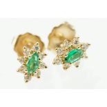 Pair of 14ct gold, emerald and diamond cluster earrings. The each set with a central marquise cut