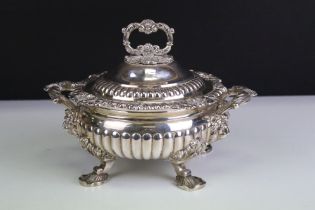 19th Century George III silver hallmarked lidded tureen having moulded gadrooned, shell and