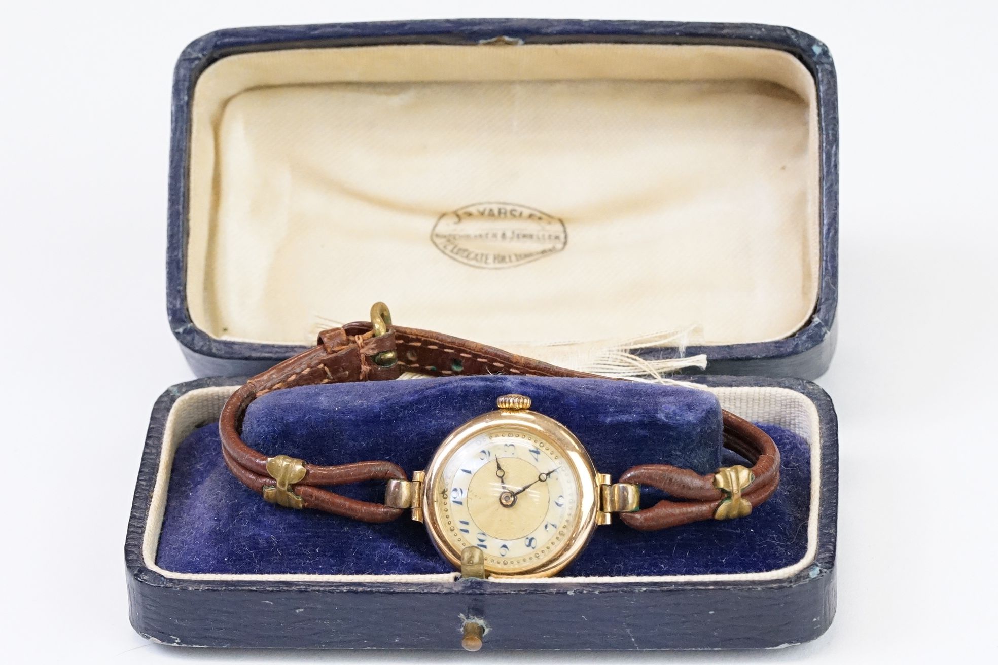 A 1930's fully hallmarked ladies V.W.C. 9ct gold cased wristwatch with enamel and mother of pearl