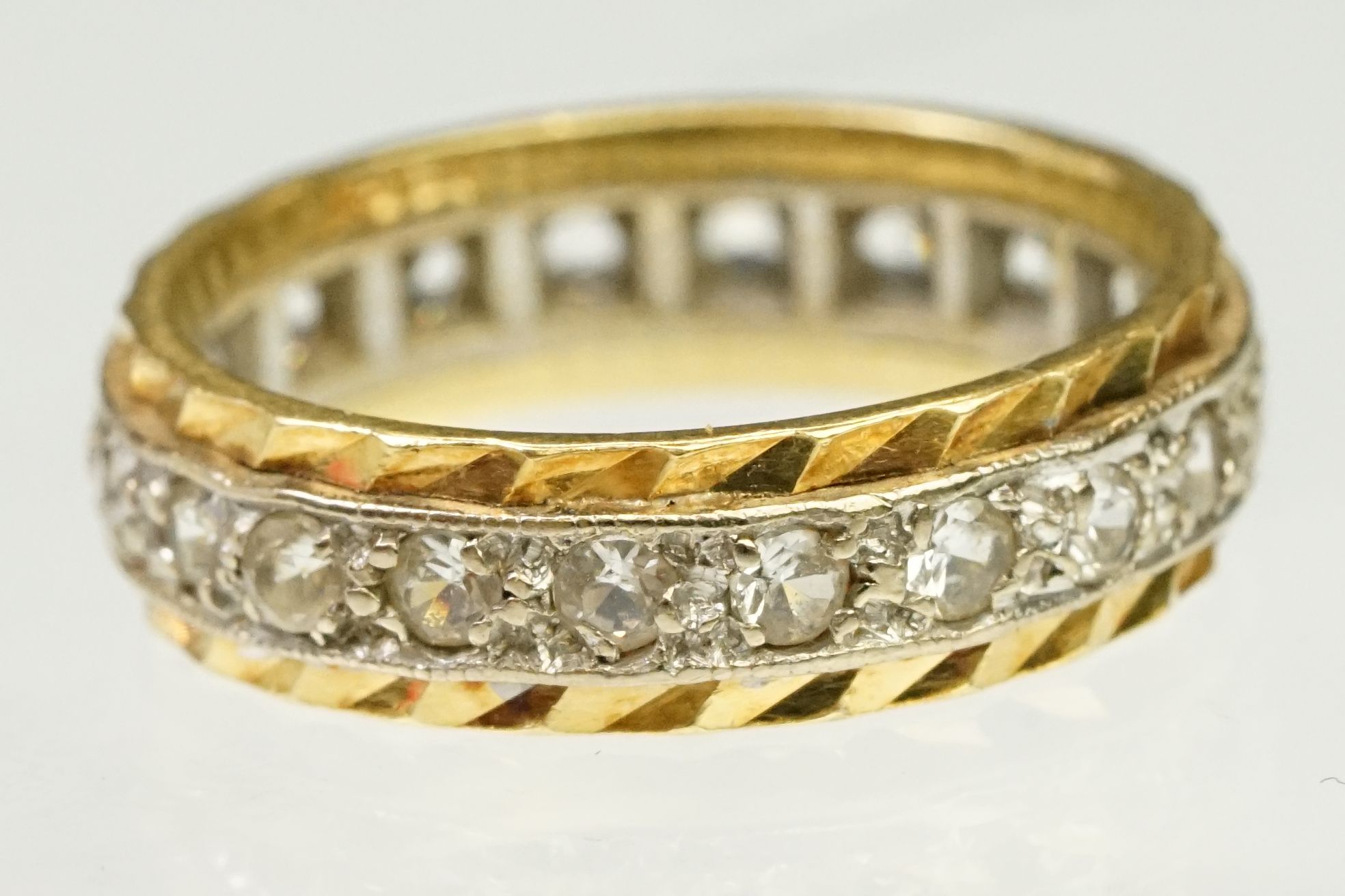 Two tone 18ct gold and white stone eternity ring. Marked 18ct to band. Size G.5. - Image 2 of 7
