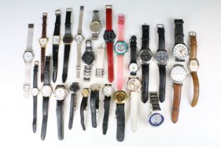 A collection of twenty five mainly contemporary quartz ladies and gents wristwatches to include