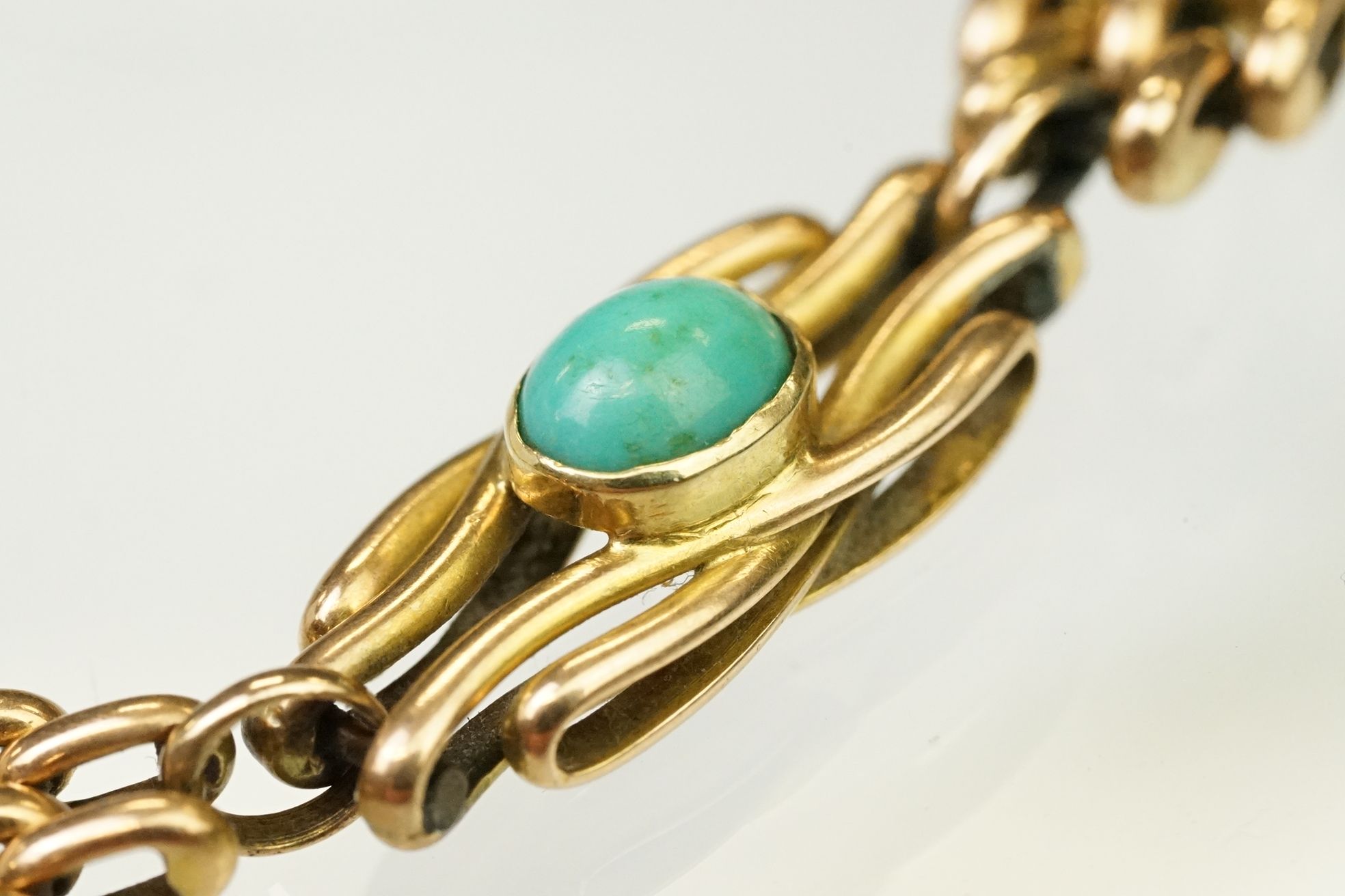 15ct gold and turquoise gate link bracelet. The bracelet being beze set with five oval turquoise - Image 3 of 10