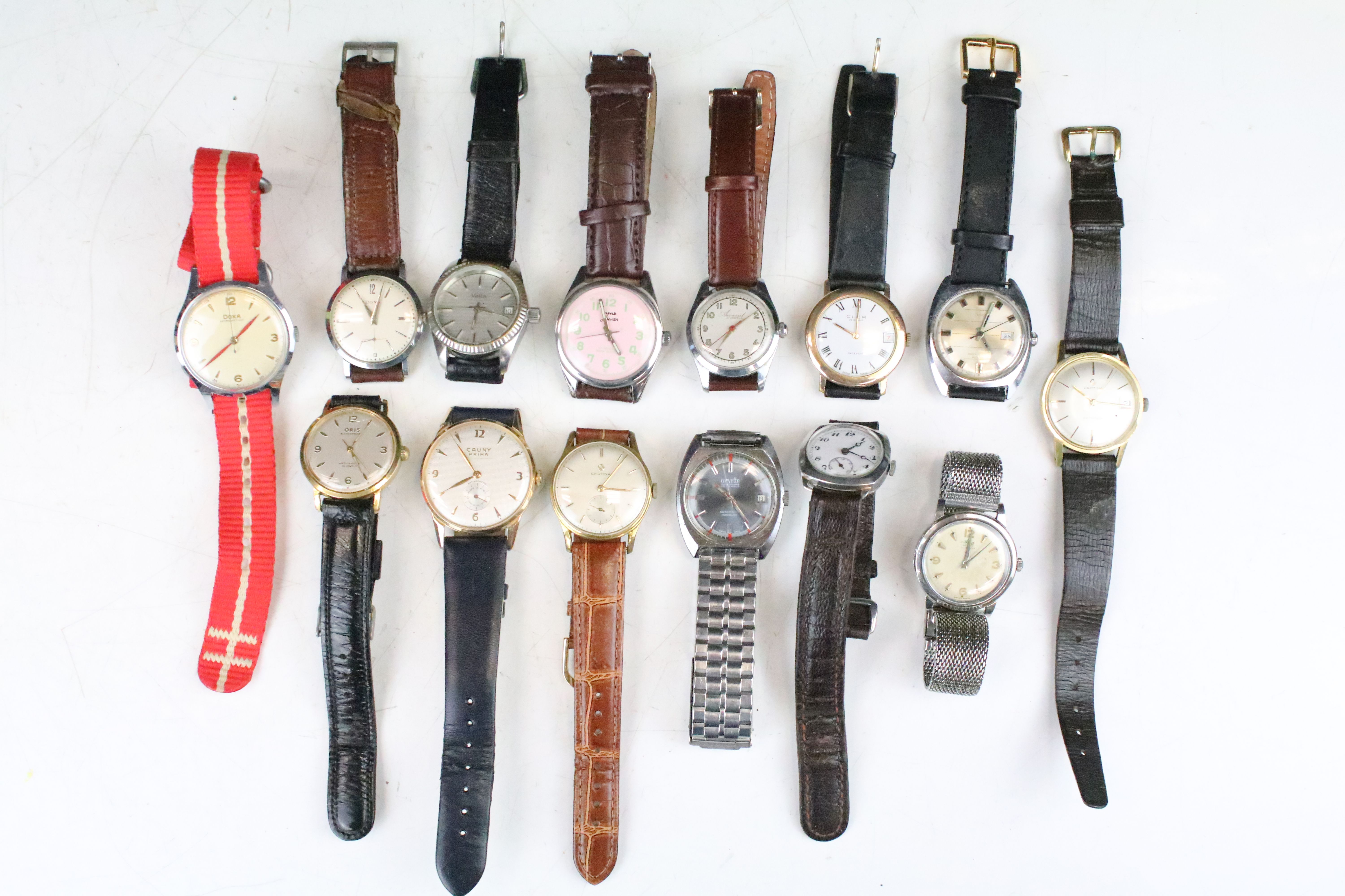 A collection of fourteen mechanical wristwatches to include Corvette, Vetta, Doxa, Certina, Cauny,