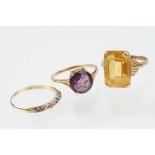 Three 9ct gold stone set rings to include a 9ct gold and citrine dress ring (marked 9ct, size M.