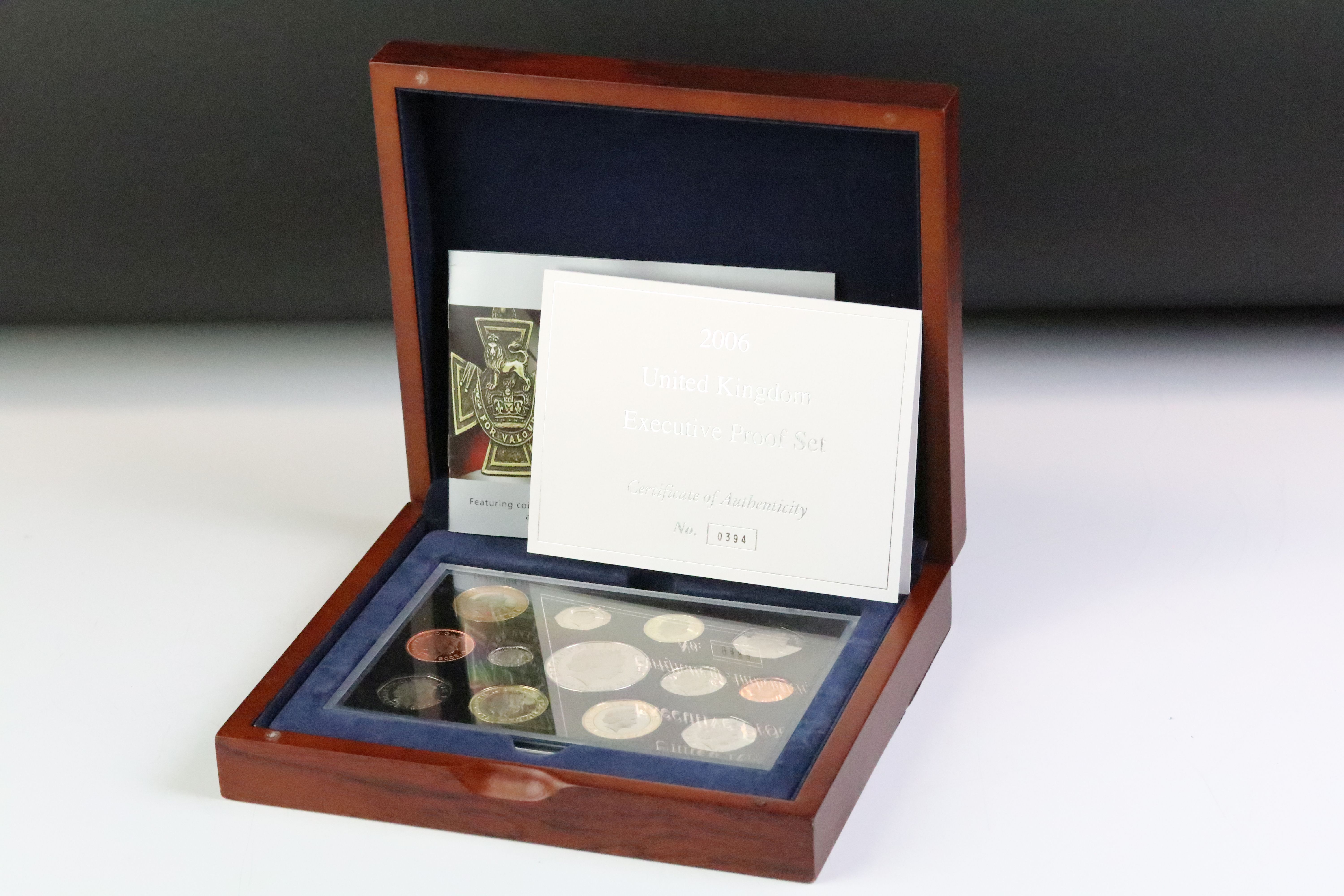 A Royal Mint United Kingdom 2006 Executive twelve coin proof set, set within wooden presentation